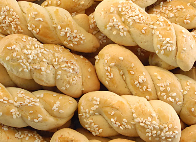 Koulouria — Traditional Greek butter cookies lightly sweetened and baked until golden, with a delicate hint of vanilla and orange.
