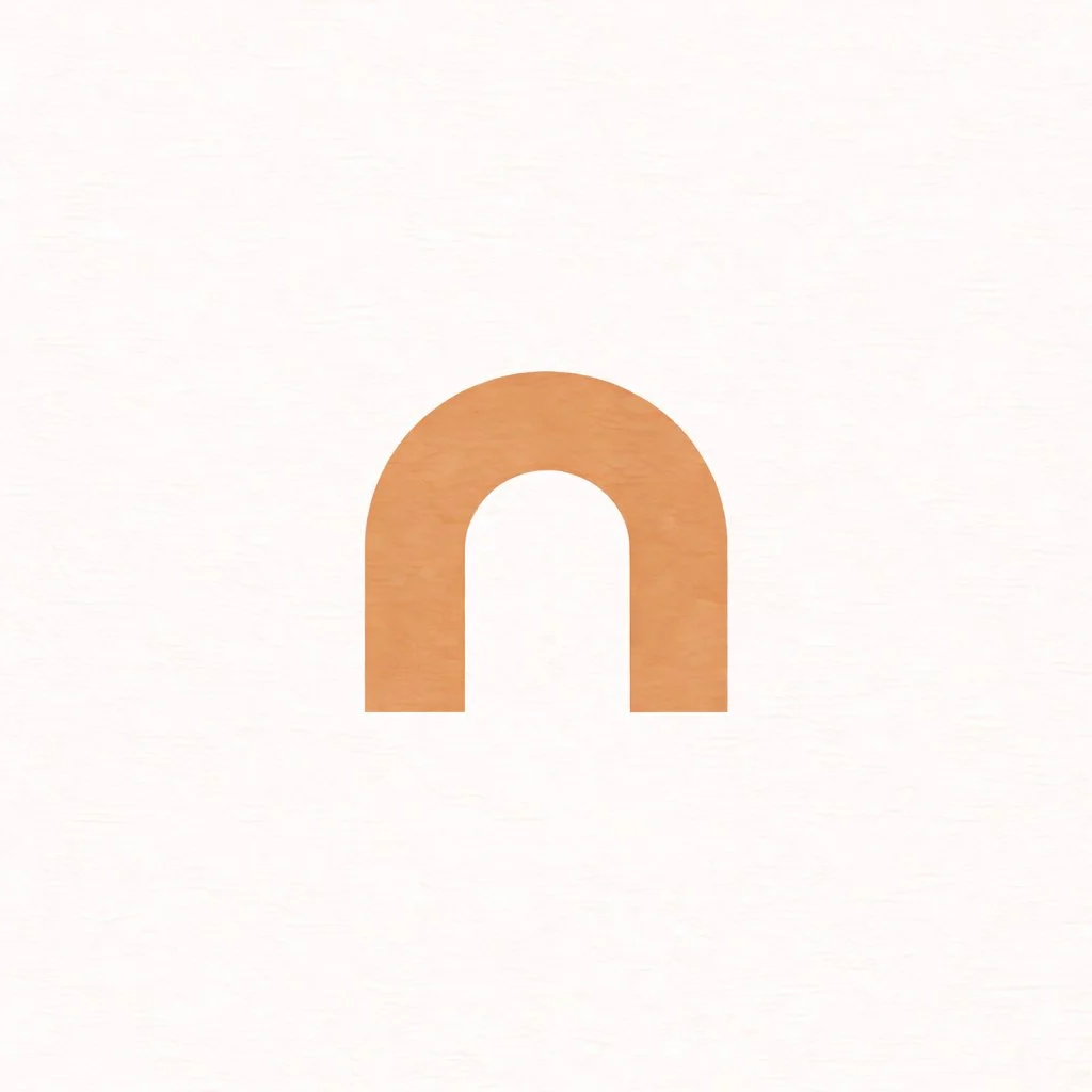 A minimalistic graphic of a rounded arch shape in a beige color on a white background.
