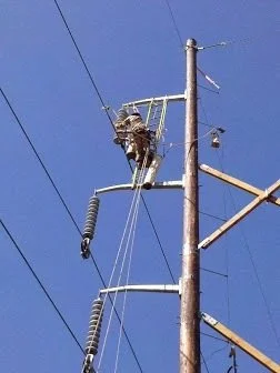 IBEW outside line workers on a power line construction site