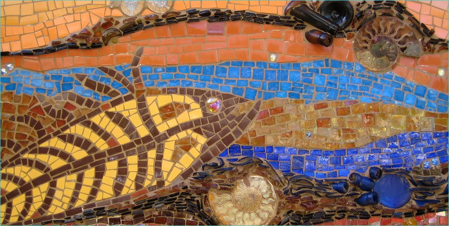 Colorful mosaic artwork with waves, shells, and bottles.