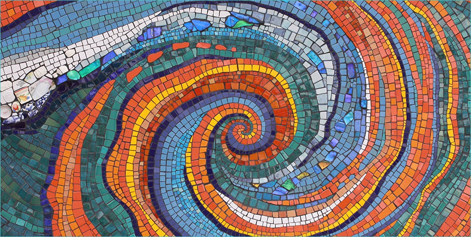 Colorful mosaic spiral pattern with small square tiles in shades of blue, green, orange, red, yellow, and white.