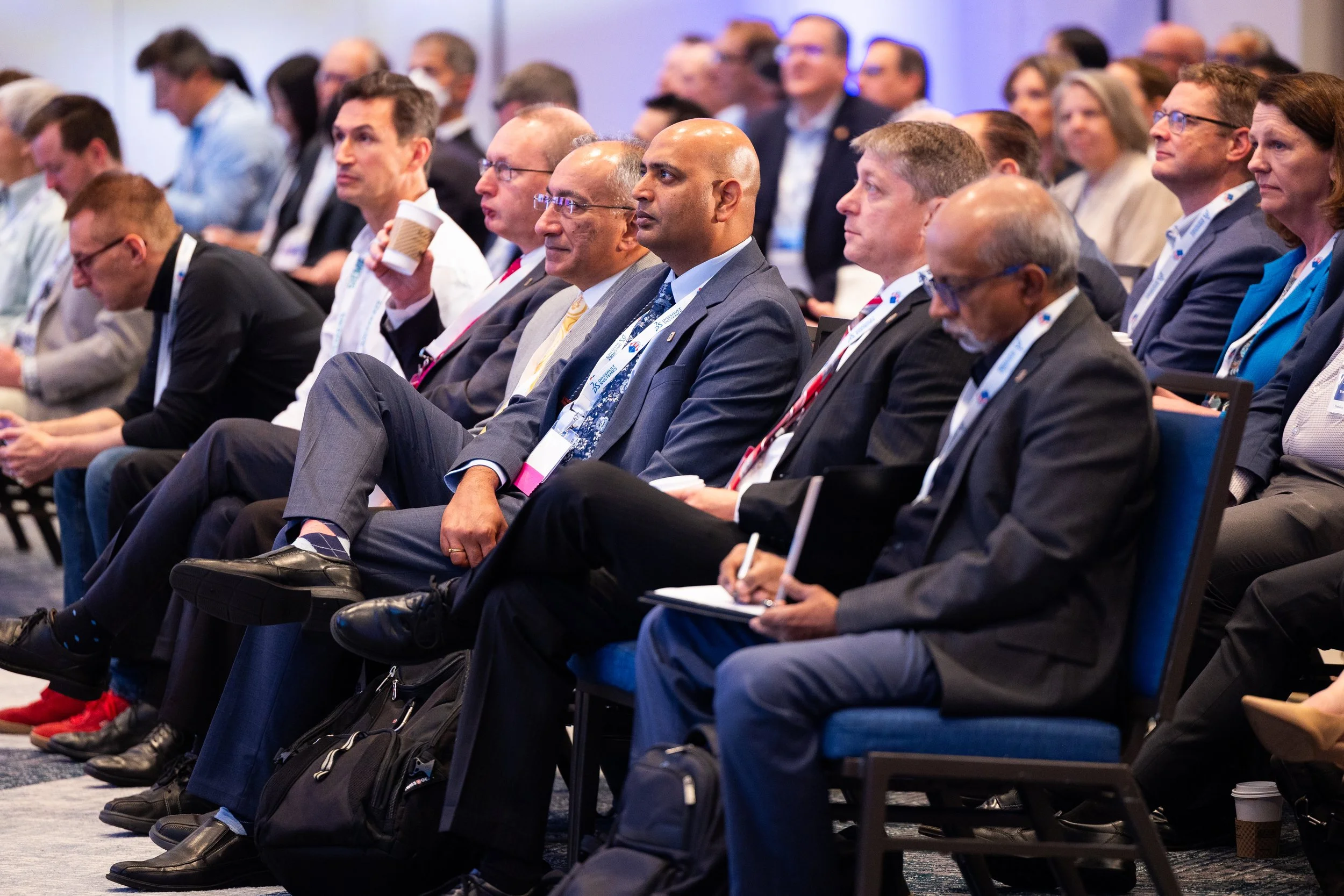 Corporate conference audience and speakers at professional event in Washington DC