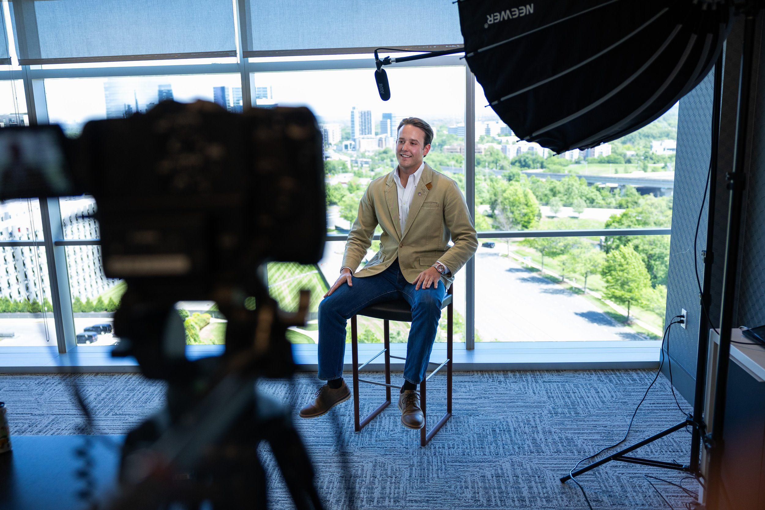 Wide angle behind-the-scenes shot of Canon C70 and executive interview subject at Tysons Corner Virginia corporate video production