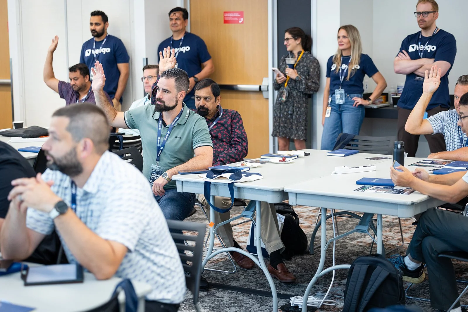Attendees participating in group discussion during corporate event at AWS Jasper in Arlington Virginia
