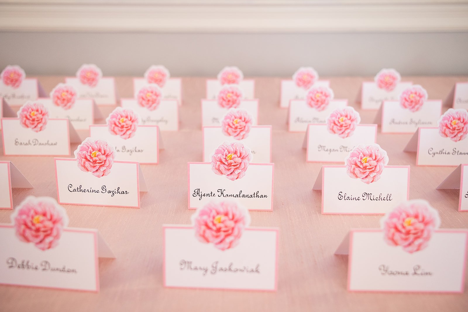 Custom pink peony place cards arranged on event table at Morrison House Old Town Alexandria