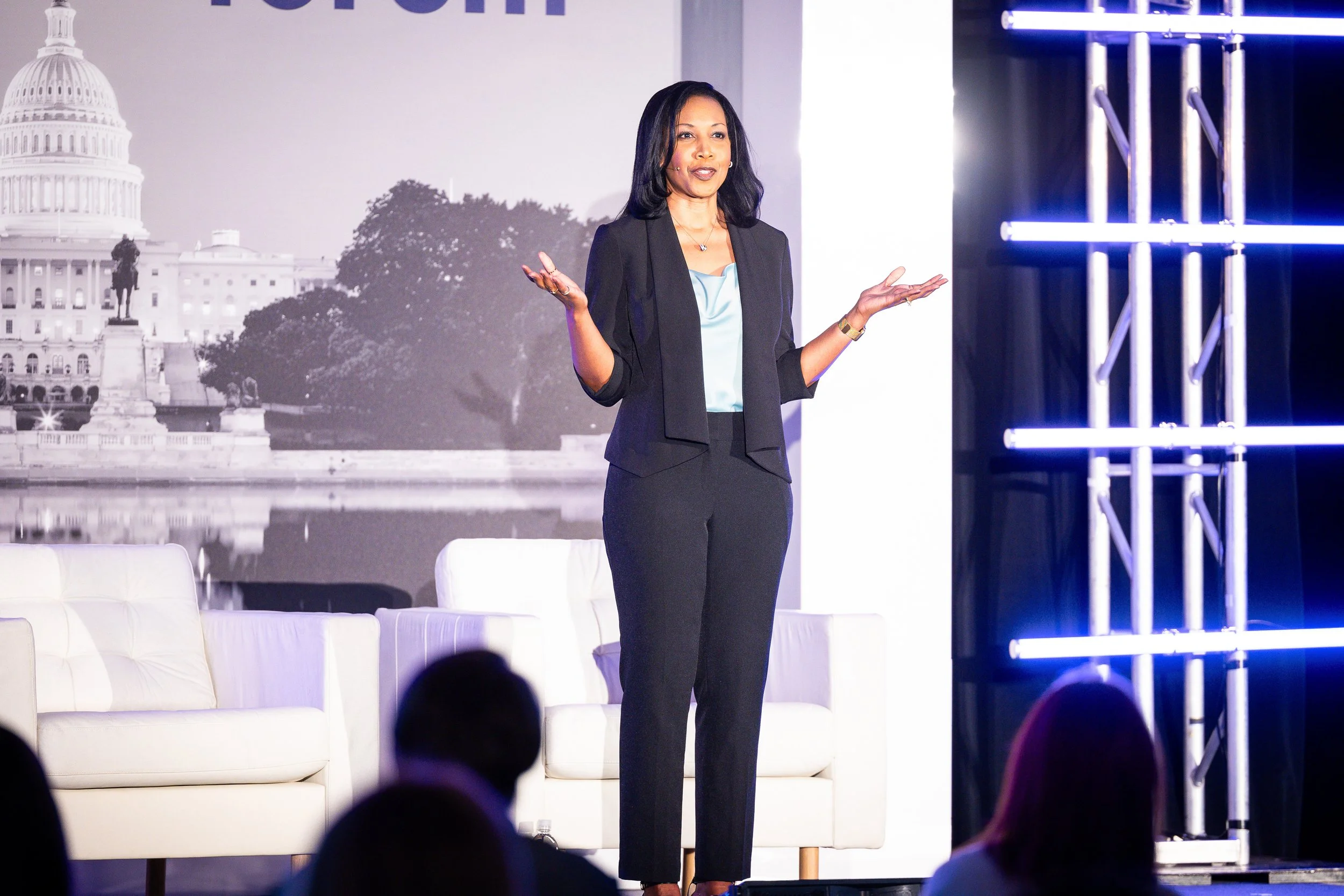 Keynote presentation on stage during corporate conference event with audience in Washington DC