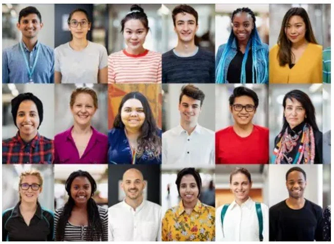 A diverse group of 16 young adults posing for a portrait, arranged in four rows of four.