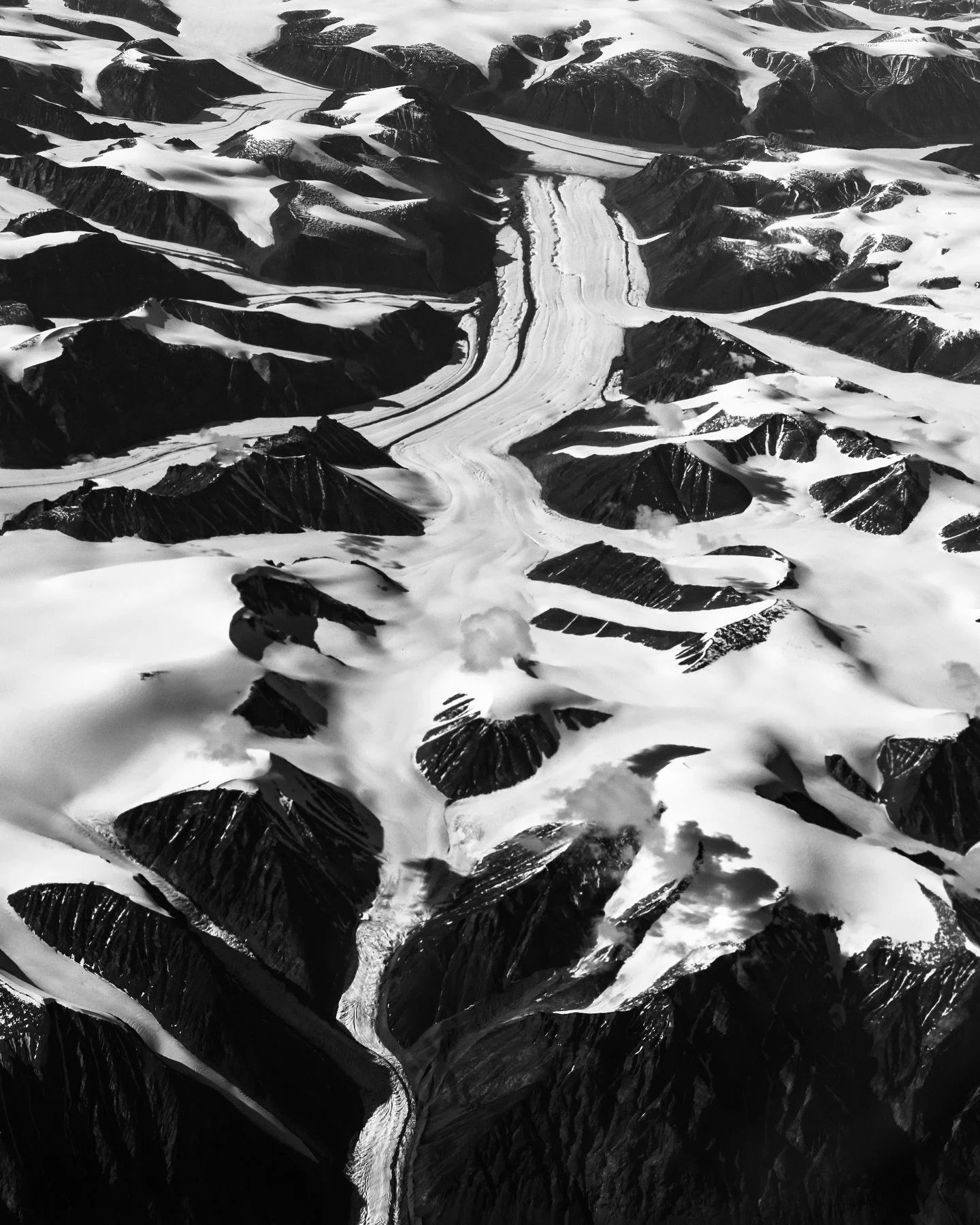 Somewhere down there&hellip;.

There&rsquo;s a team of climbers on approach skis pulling hundreds of pounds of gear on sleds with their bodies in search of a big wall first ascent. 

A crew of scientists traverses the barren landscape collecting data