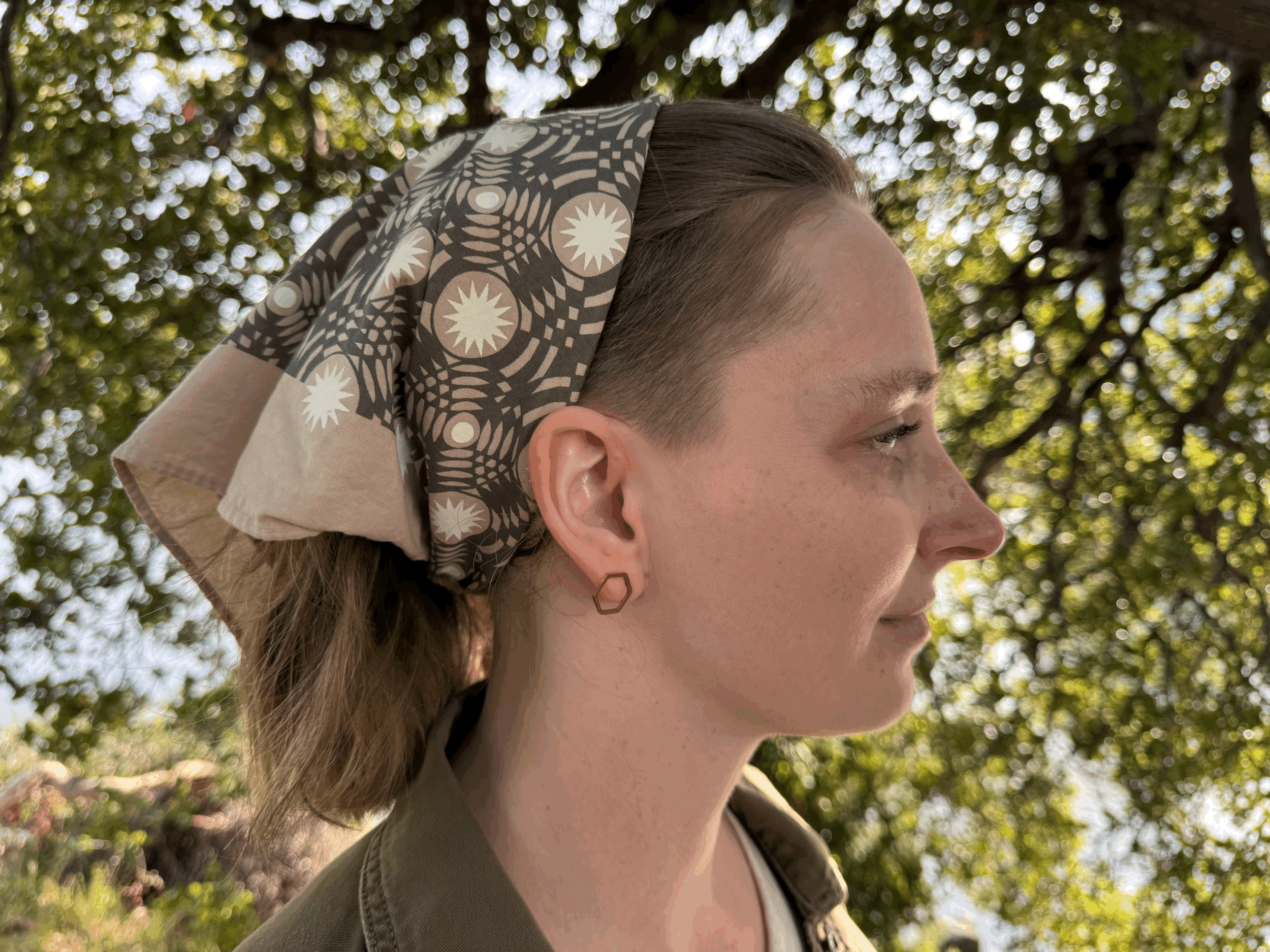 Sand Dune Bandana on hair profile under tree.gif