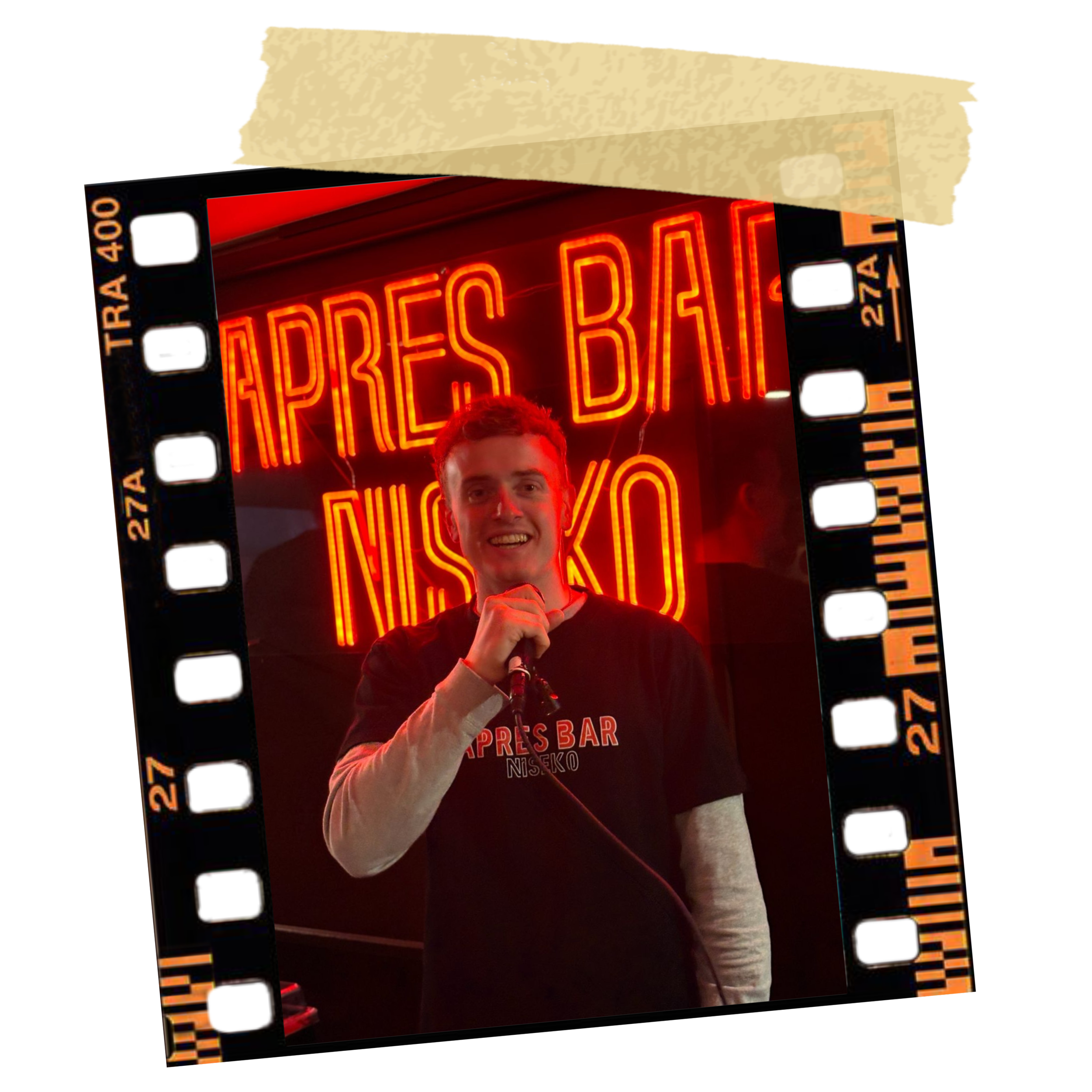 Neon restaurant sign reading "PIZZA BAR" with a person standing in front, partially visible, holding their hand near their chin in a gesture of thought or speech. The sign is framed like a strip of film and is illuminated in red and orange tones.