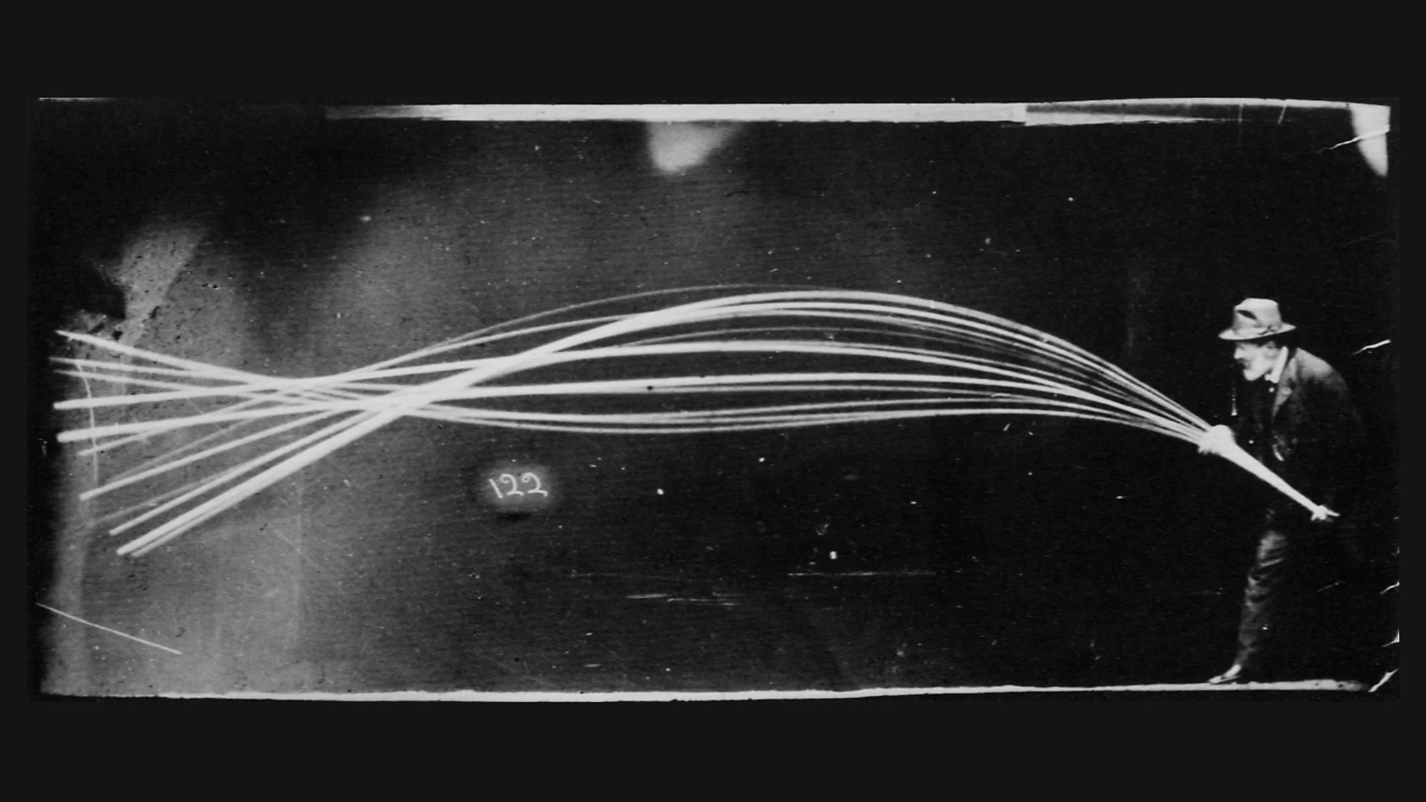 Marey 1886: chronophotograph showing sinuous wave trail of oscillating flexible rod – first visualisation of wave motion.