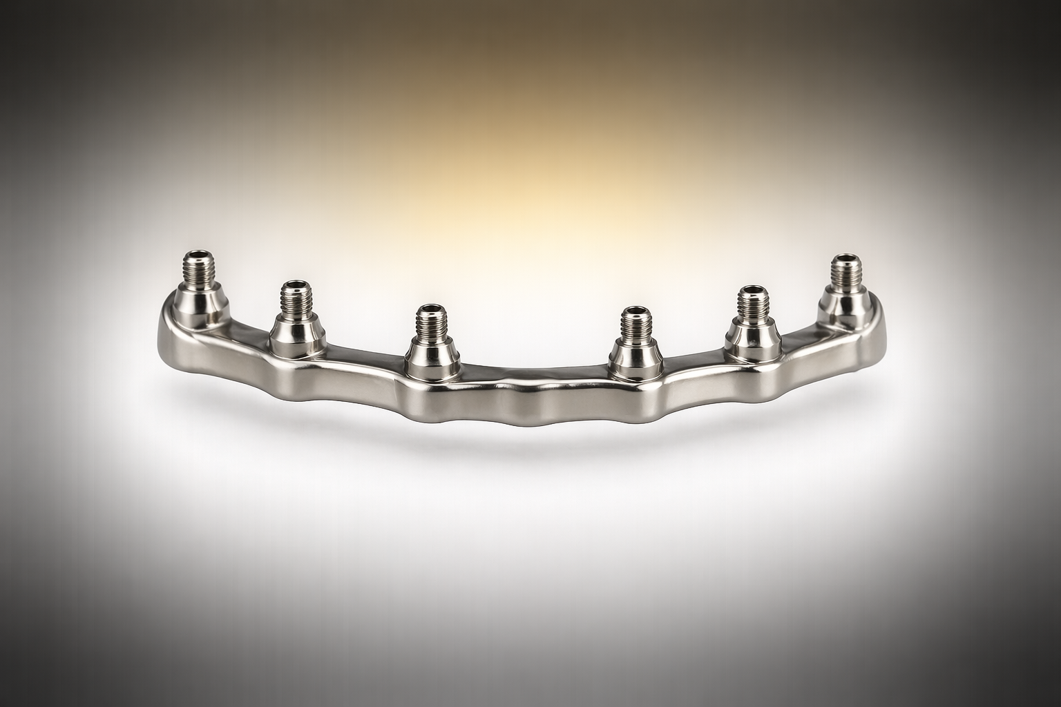A metallic dental implant bar with six threaded connectors, used in dental prosthetics.