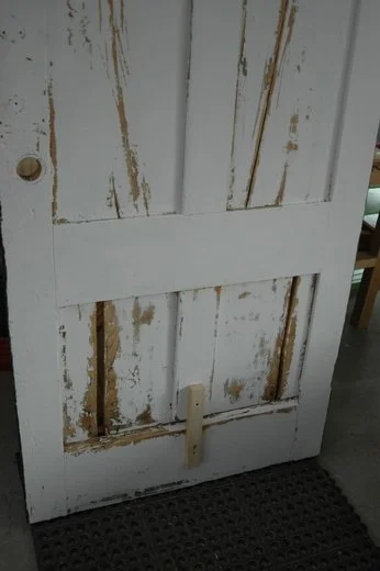 Door before restoration.