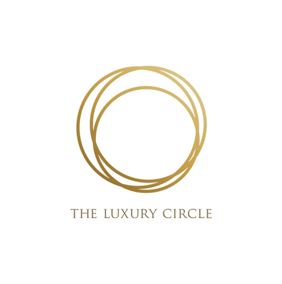 Gold-colored abstract circle design with the text 'The Luxury Circle' below.