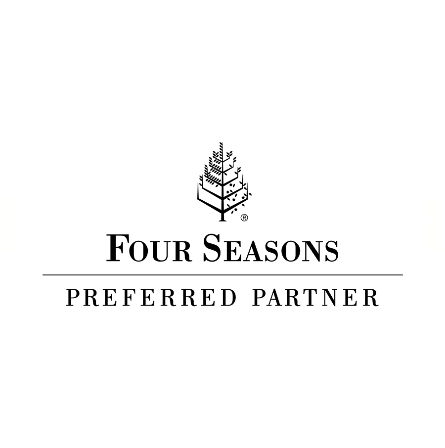 Four Seasons Preferred Partner logo with a stylized black tree and text in black on a white background.