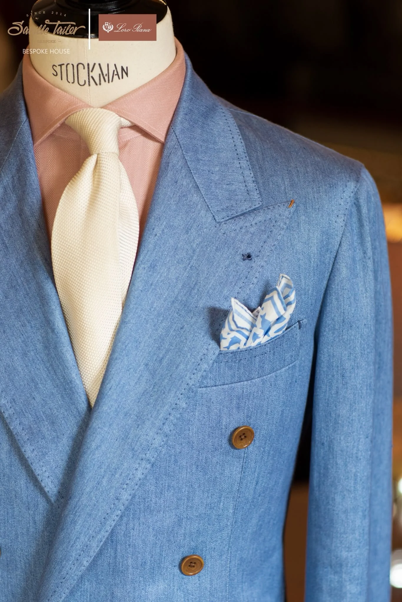 A bespoke suit created to fit for a pastel wedding theme.