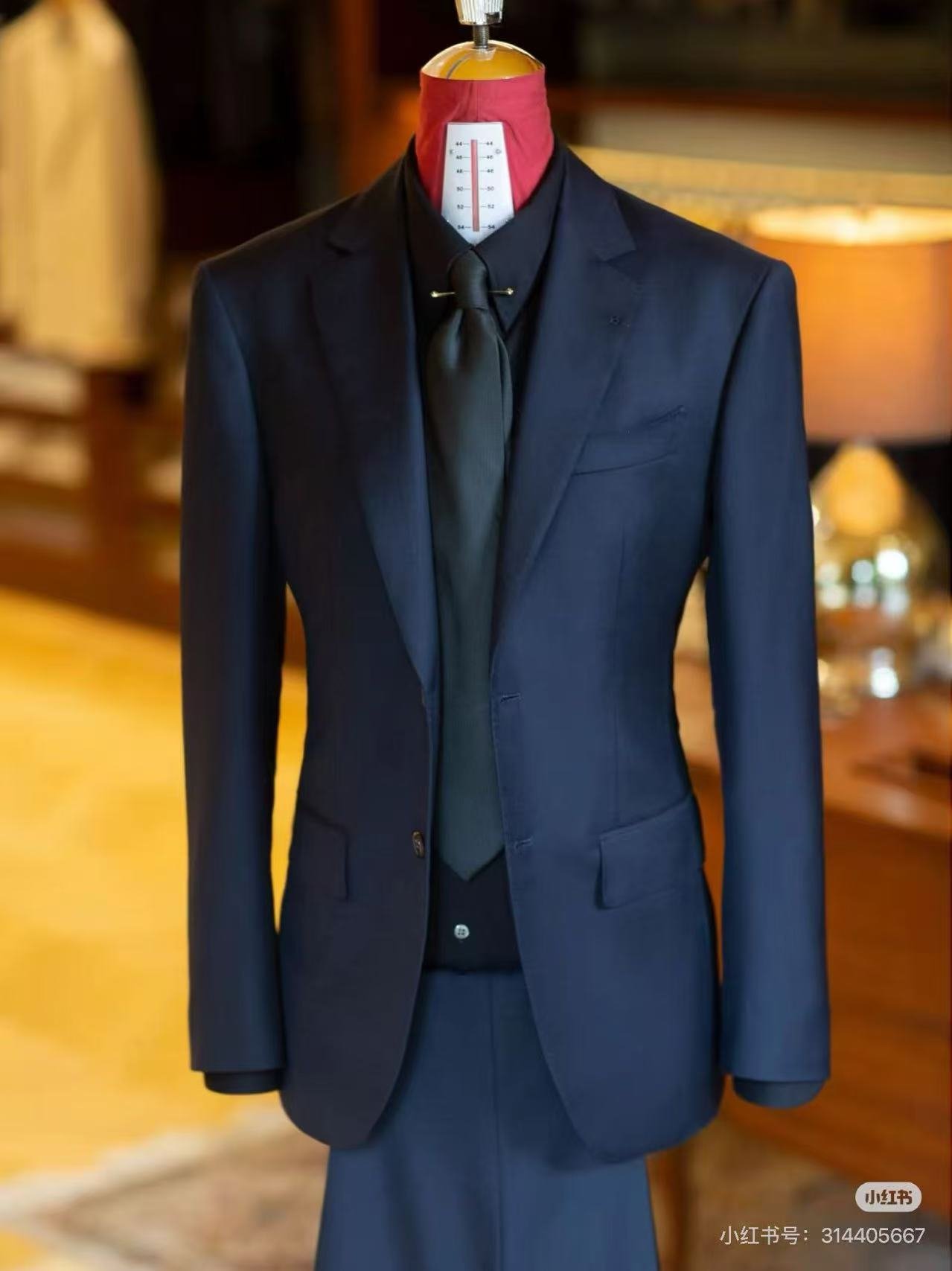 Navy bespoke suit.