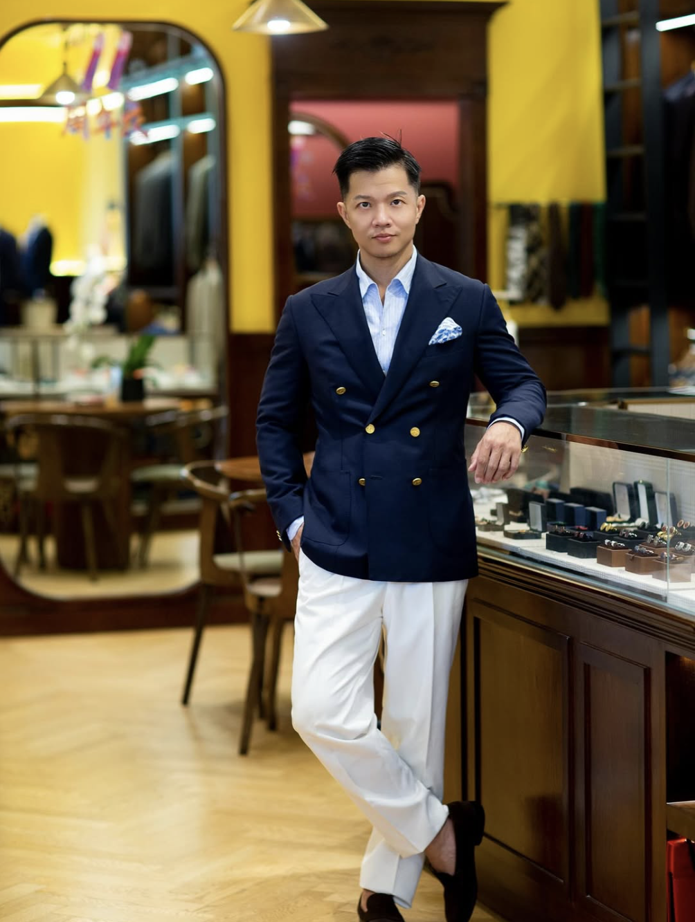 A man dressed in a bespoke suit.