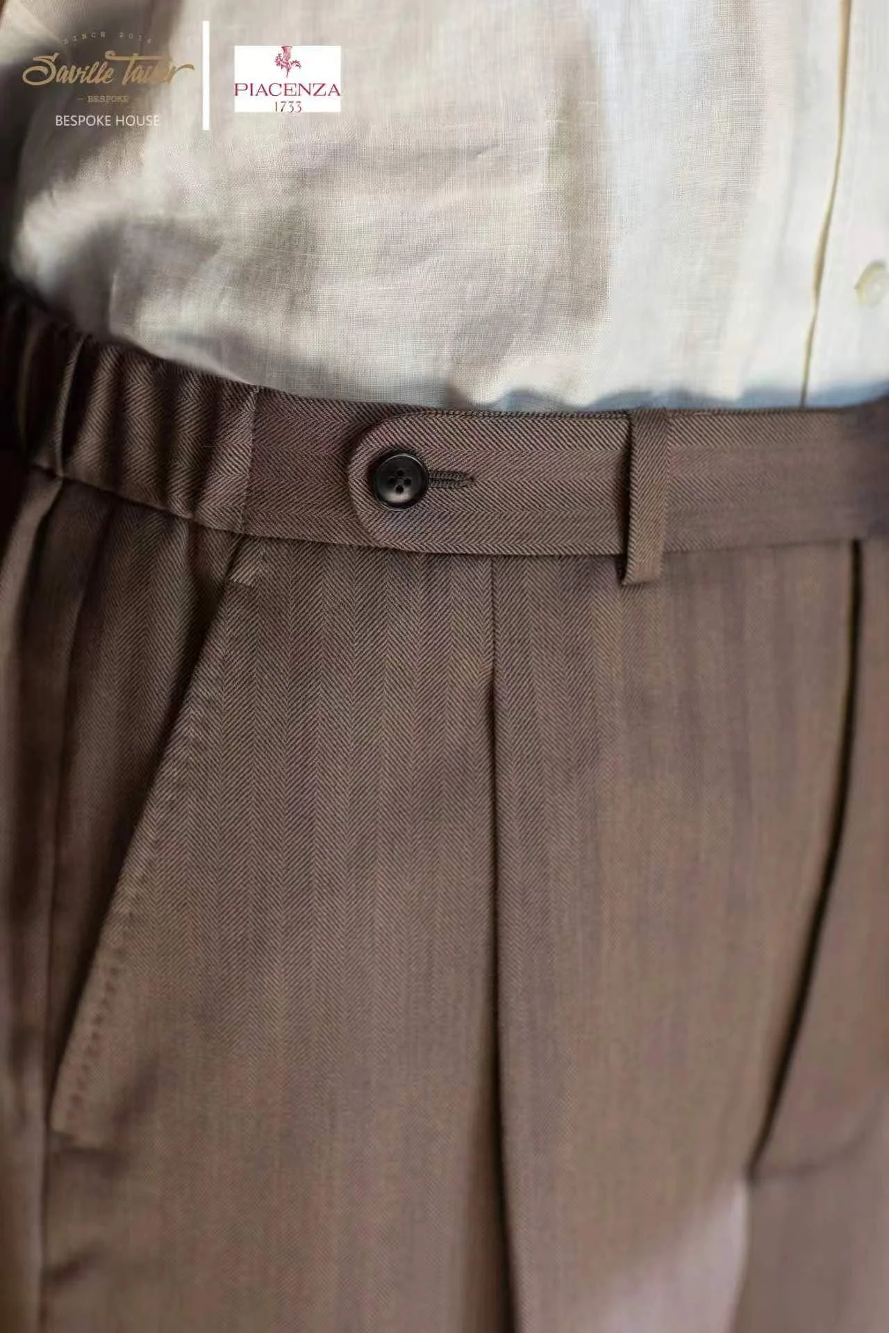 This is a brown suit with personalised customisation to fit client's requirement.