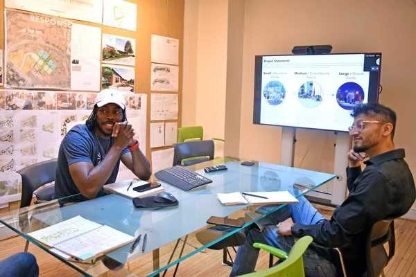 brandon-and-taha-in-conference-room.jpg
