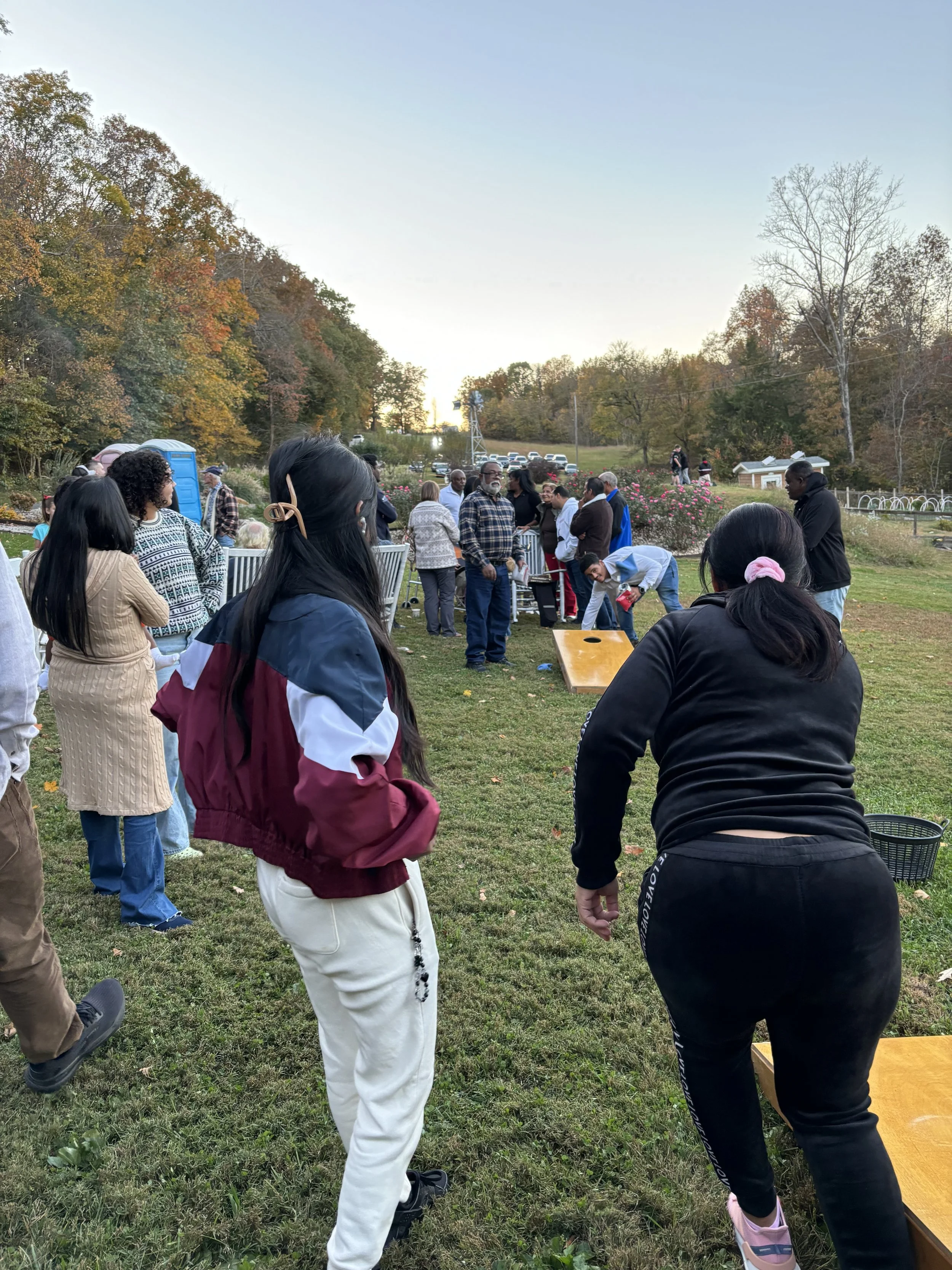  Gathering of people outside playing games at a festival 