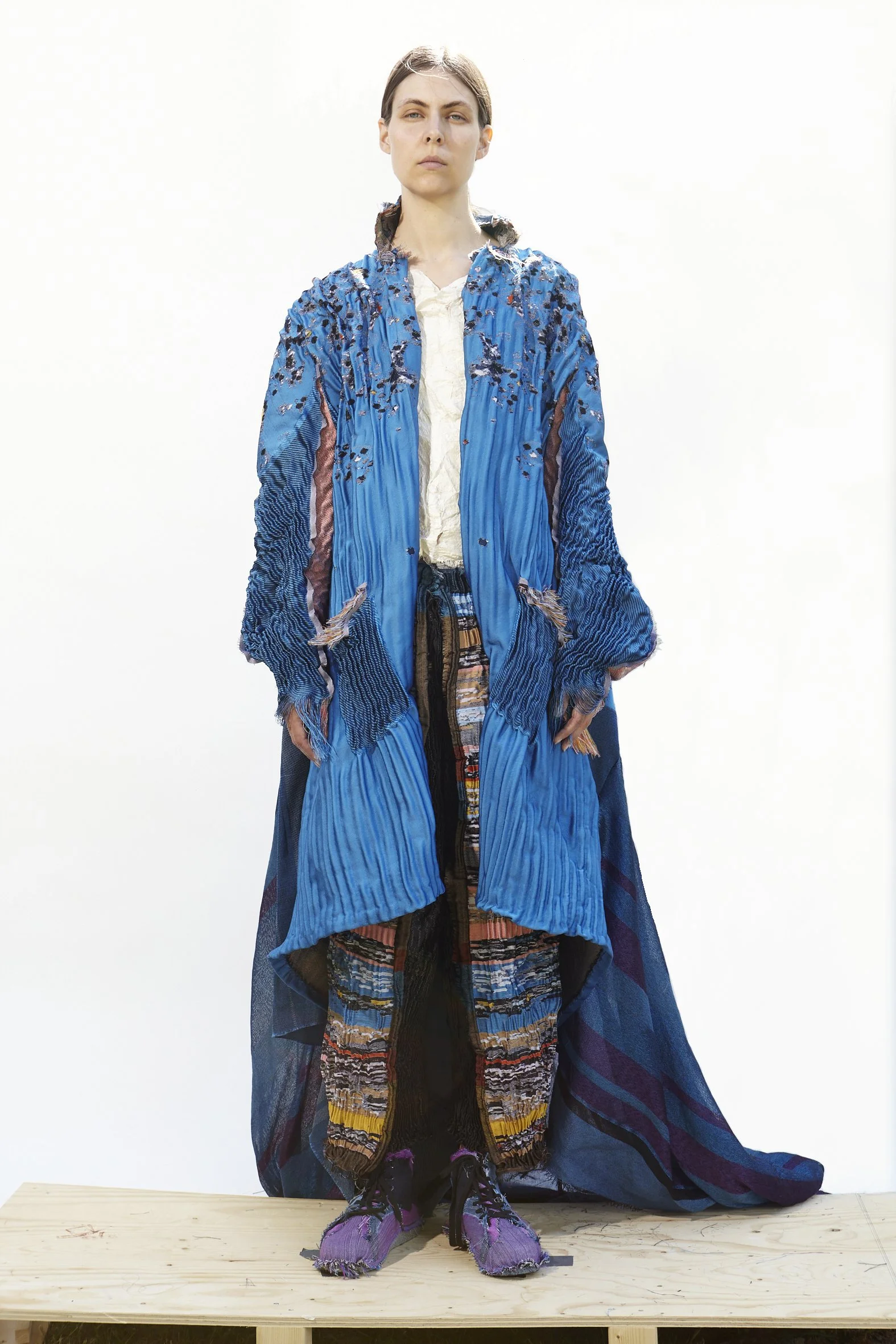 Zero Waste Weavers - Lazurite Coat. Textile-form Woven 100% recyclable polyester with heat reactive yarn for adaptive fit