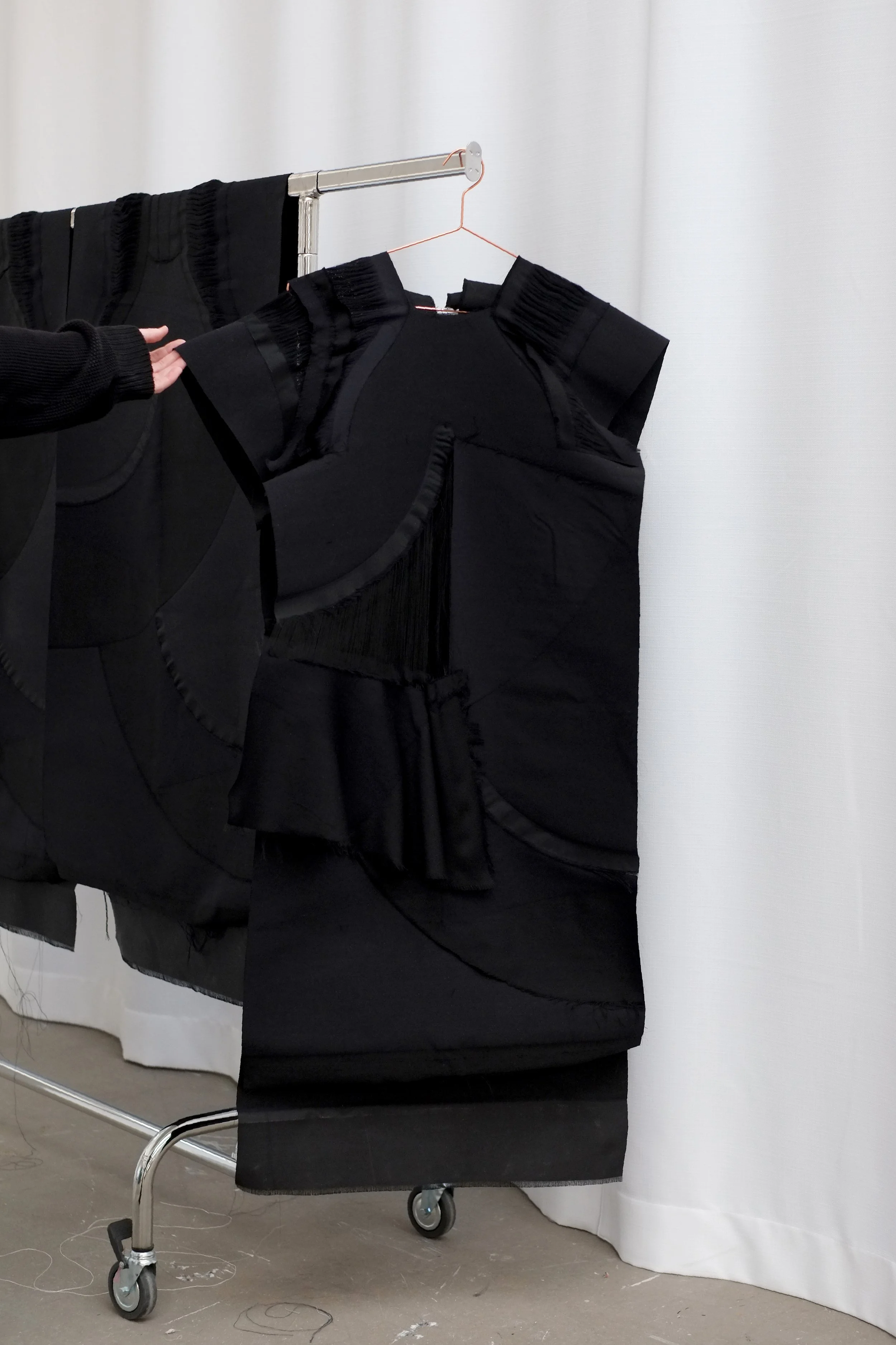 Textile-form Woven dress. To assemble the dress only 2 seams are required.