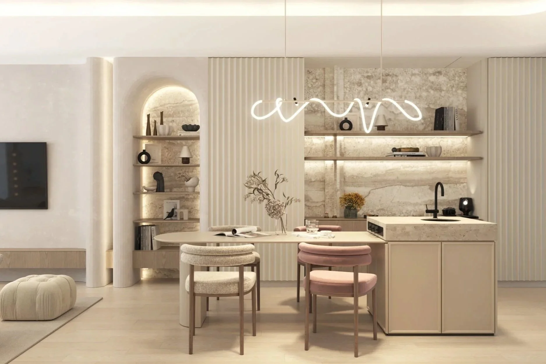Modern kitchen and dining area with beige and neutral-tone decor, featuring a marble backsplash, pendant lighting, a small sink, and open shelving with decorative items and books.