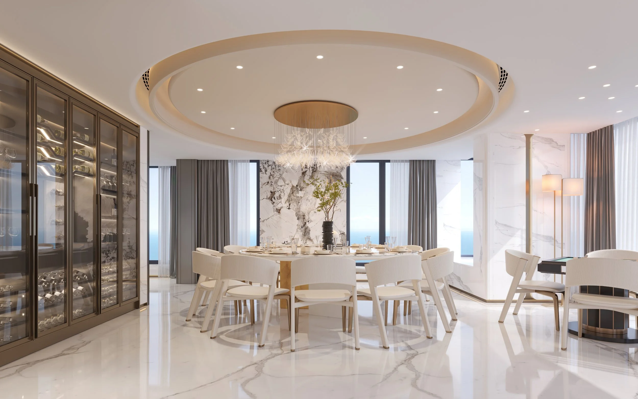 Elegant modern dining room with a round table, white chairs, a large marble wall, a wine fridge, and large windows with curtains.
