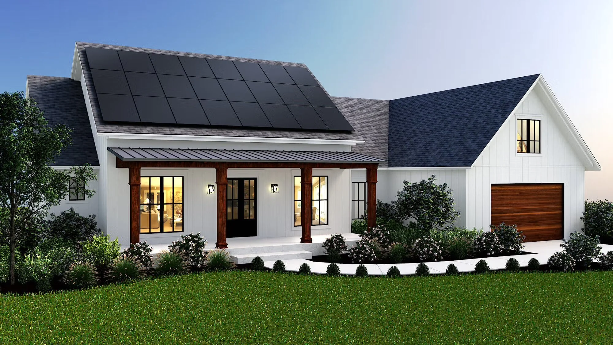 Modern white house with black solar panels on steep roof, front porch with wooden columns, large windows, well-maintained garden with bushes and green grass.