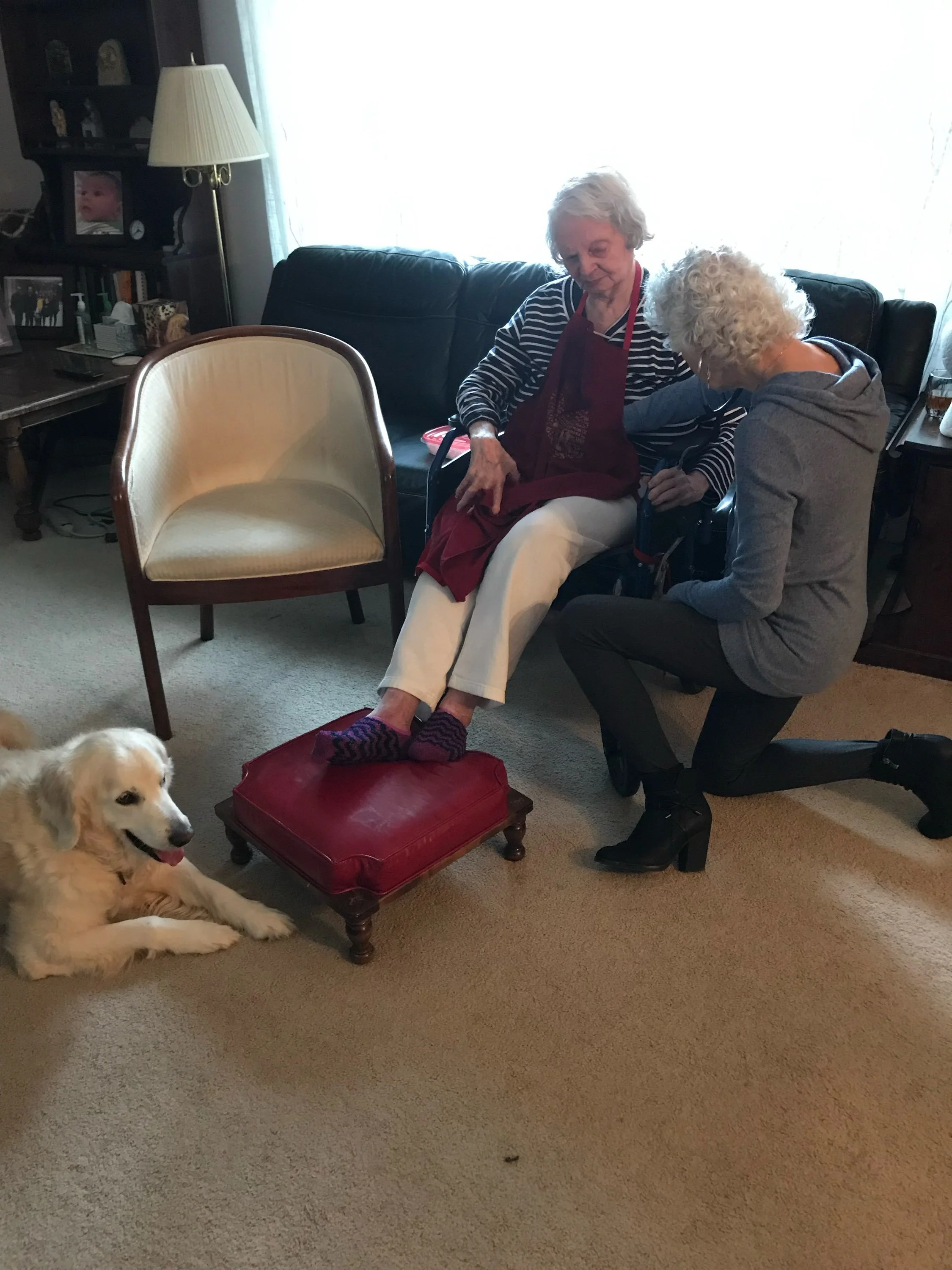 Dr. Michele Haber performing an in-home geriatric medical assessment with an elderly patient.