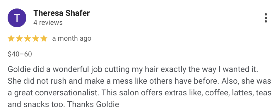 Screenshot of a Google review for a hair salon, praising a stylist named Goldie for her excellent haircut and friendly service.