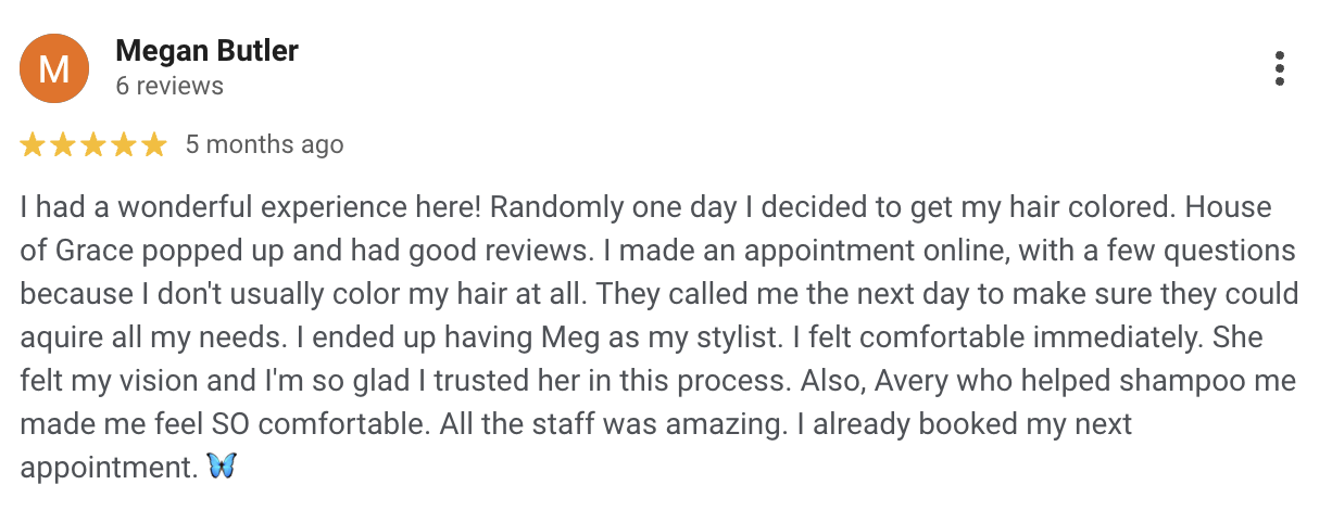 Customer review praising a hair coloring service, mentioning stylist Meg and staff, with a five-star rating and a butterfly emoji.