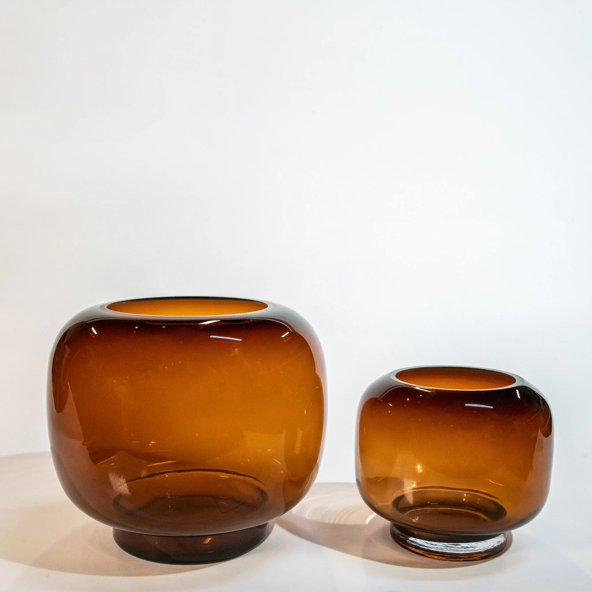 Coco Round Smoked Amber Glass Hurricane Candle Holder (9.25" dia. x 8"H) + (6.25" dia. x 5.75"H)