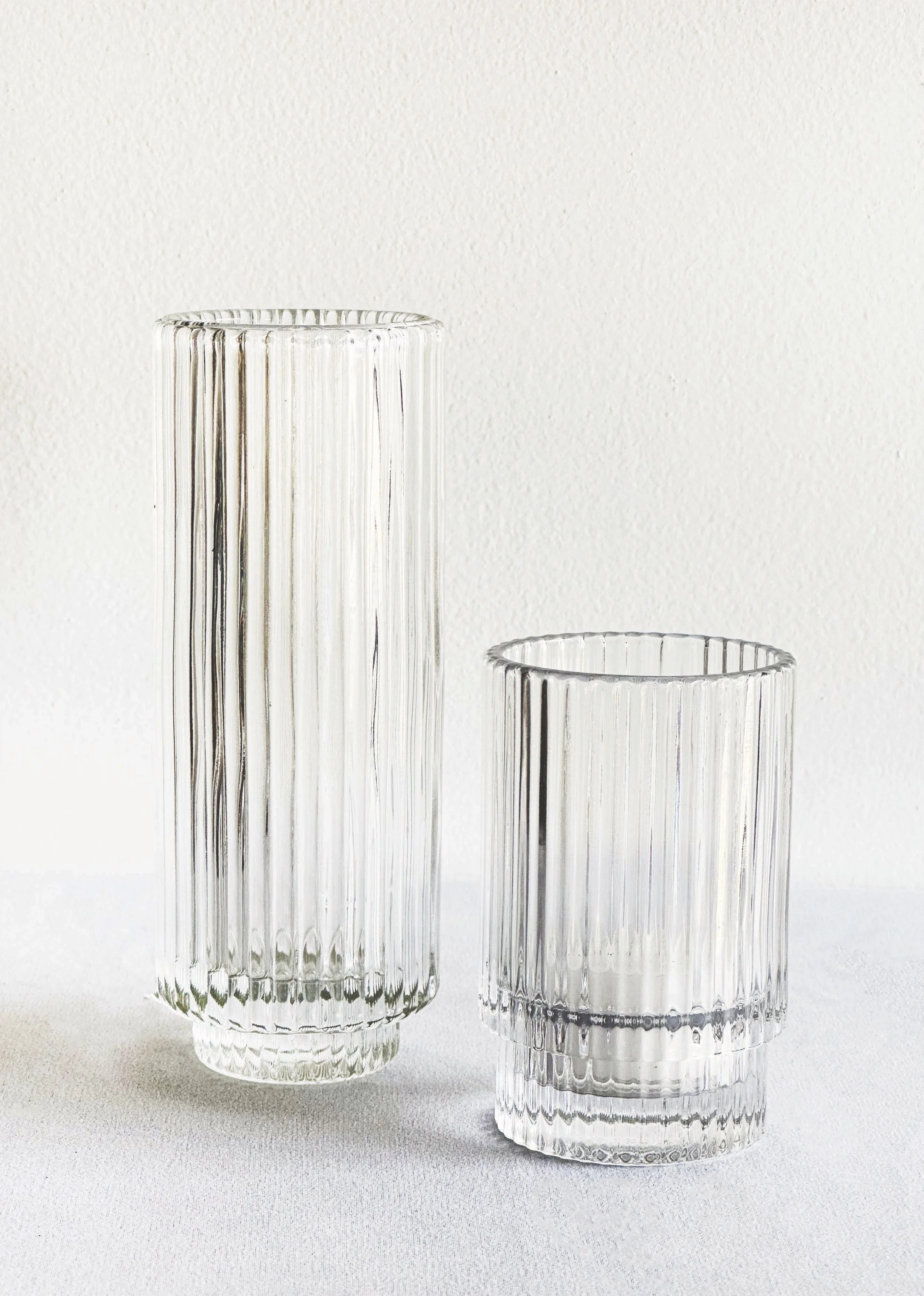 Pleated Glass Votive Holders
Short: 3.75"
Tall: 6.25"
