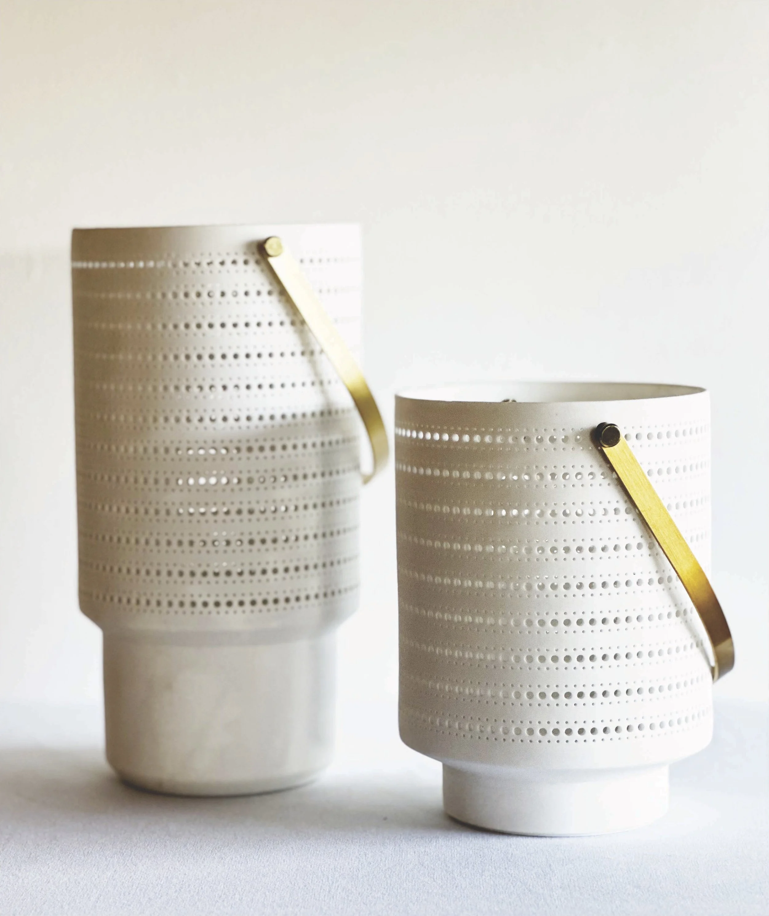 Modern White Porcelain Candleholders
Tiered Stand: 5"DIA x 9.6"H 
Small: 5"DIA x 7"H