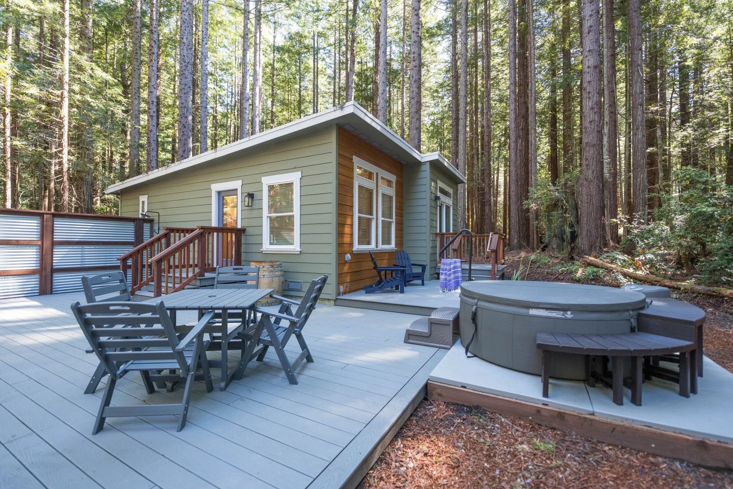 back sid eof house and hot tub mendo house.JPG