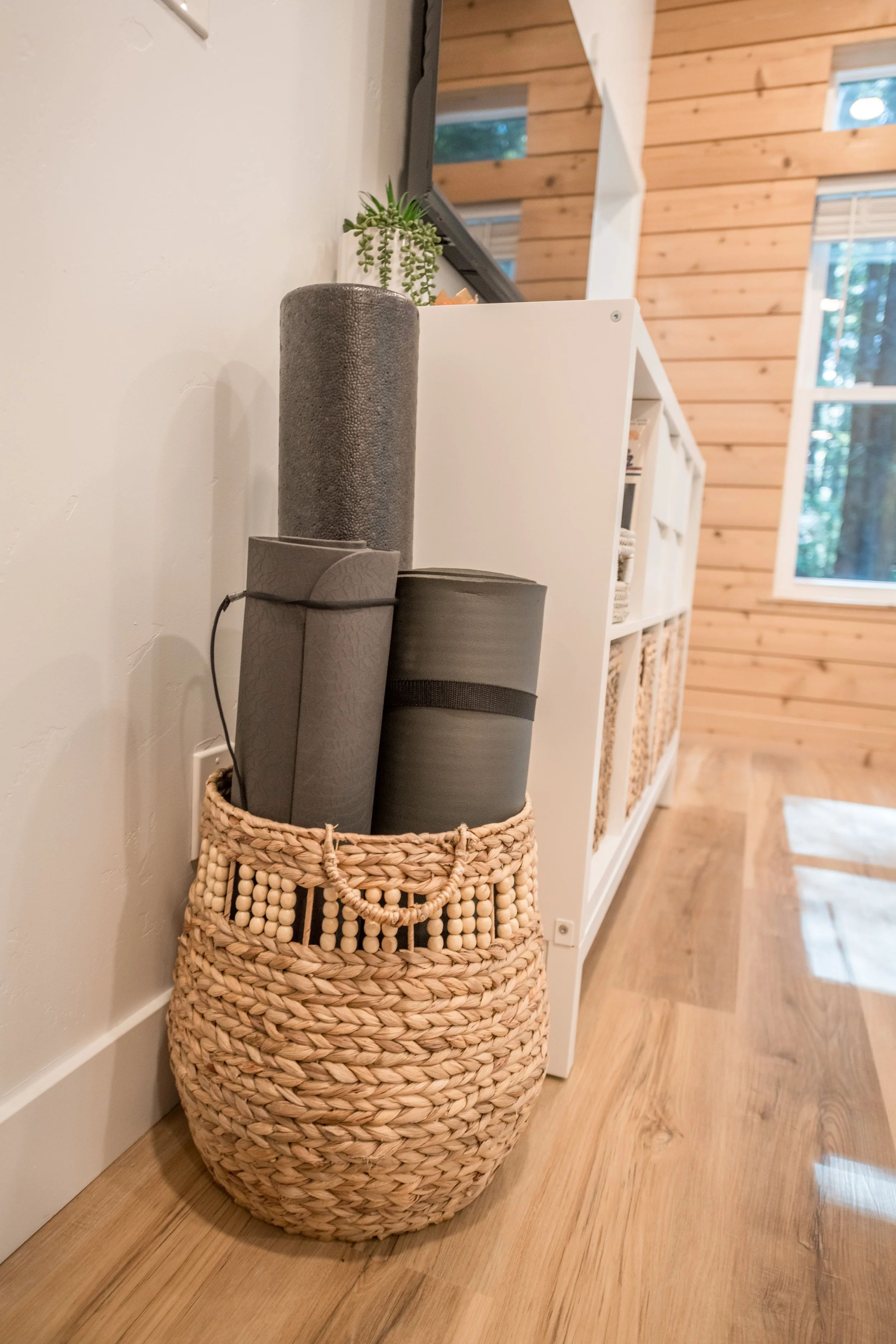 mats and roller in basket mendo house.JPG