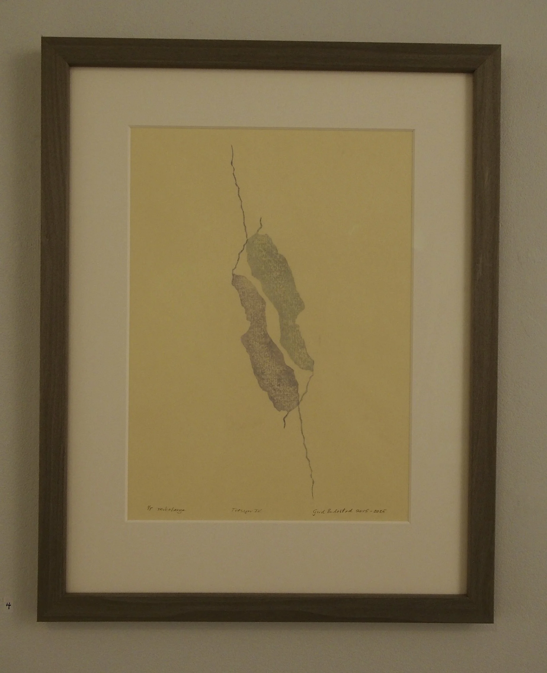 Framed artwork depicting a cracked map of Lake Michigan with handwritten notes and signatures on the bottom.