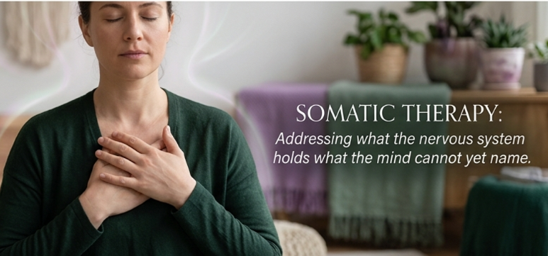 A woman with closed eyes and hands on her chest in a therapy room, with text about somatic therapy and the nervous system.