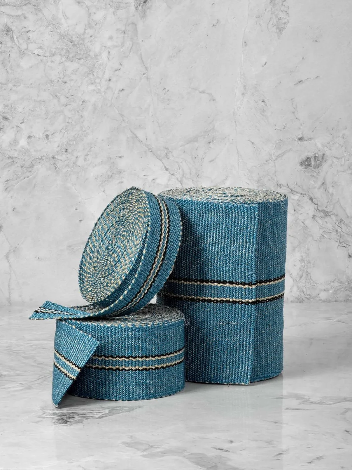 Lysefjord handwoven linen tape trim in a cool fjord blue with pinstripes of black and flax in narrow, medium and wide widths.