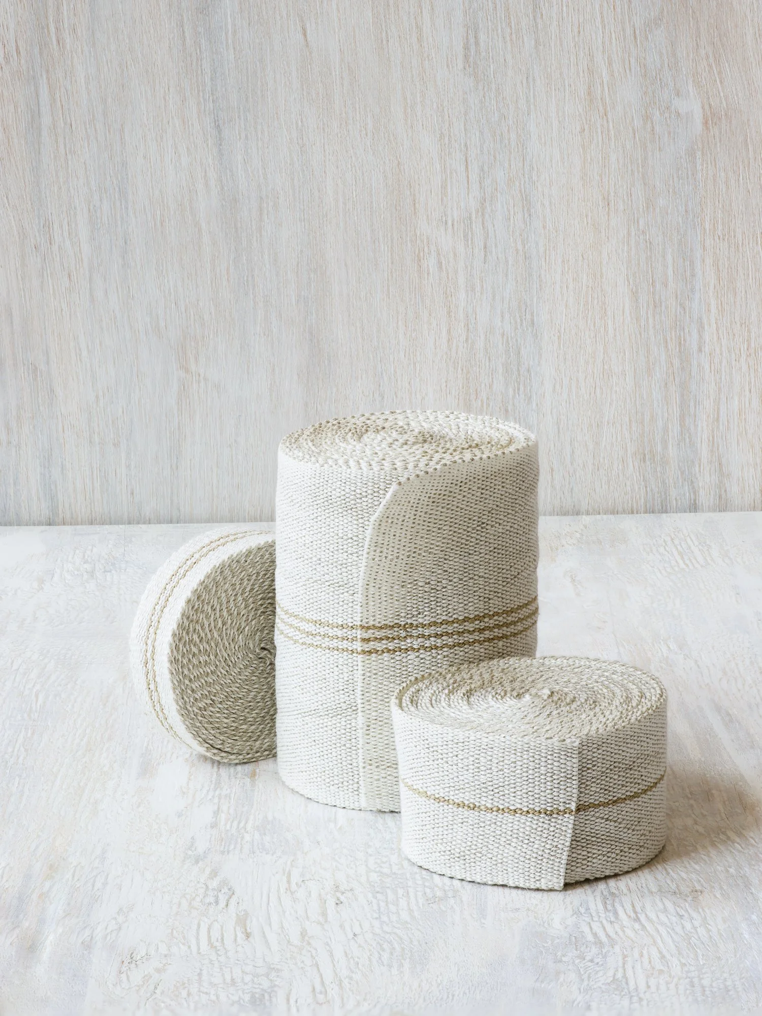Modern Neutral II: Field Lines handwoven linen tape trim with gold lines on white fields in narrow, medium and wide widths.