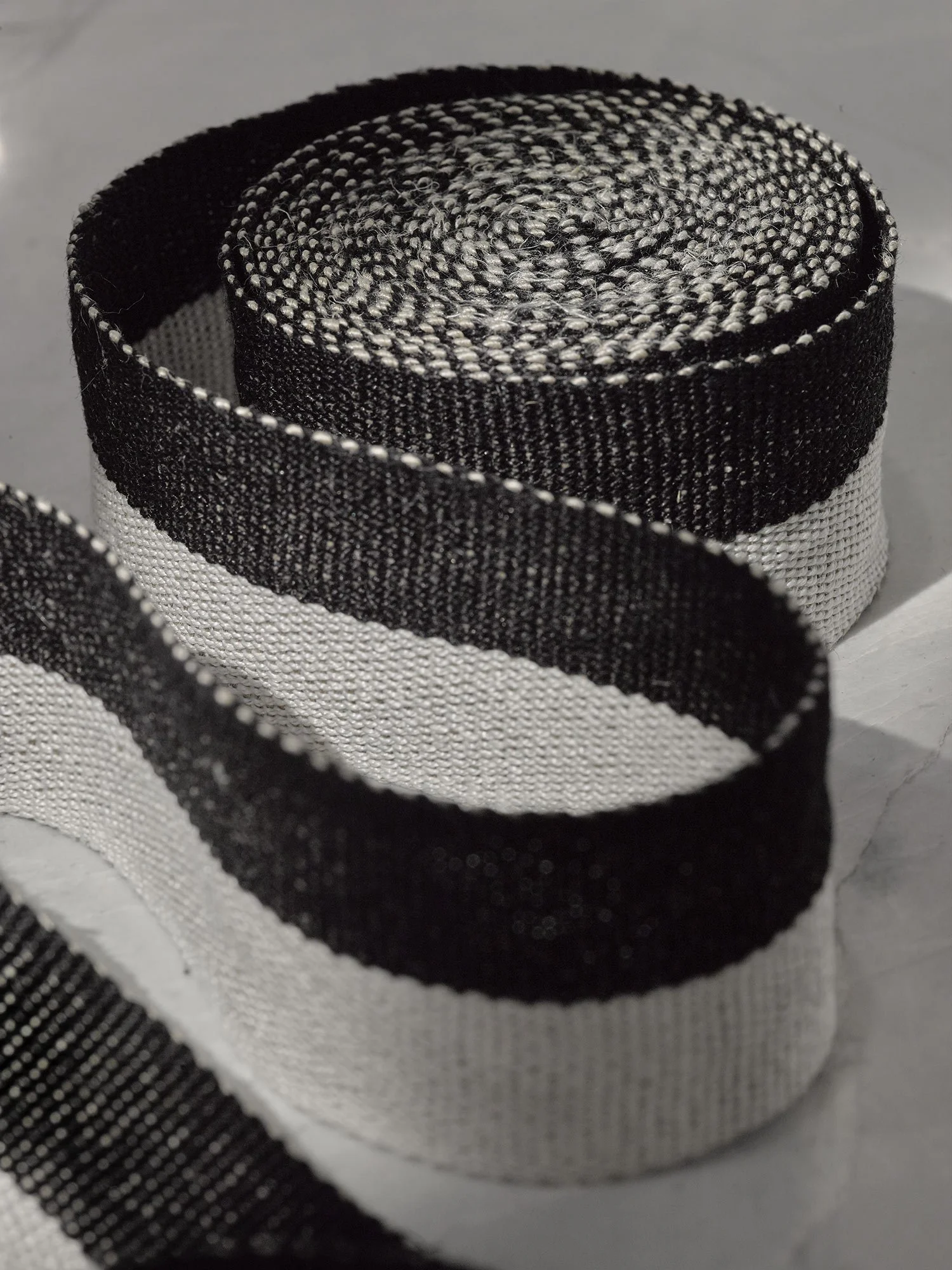 Half Black handwoven linen tape trim in a bold black and white in medium width.