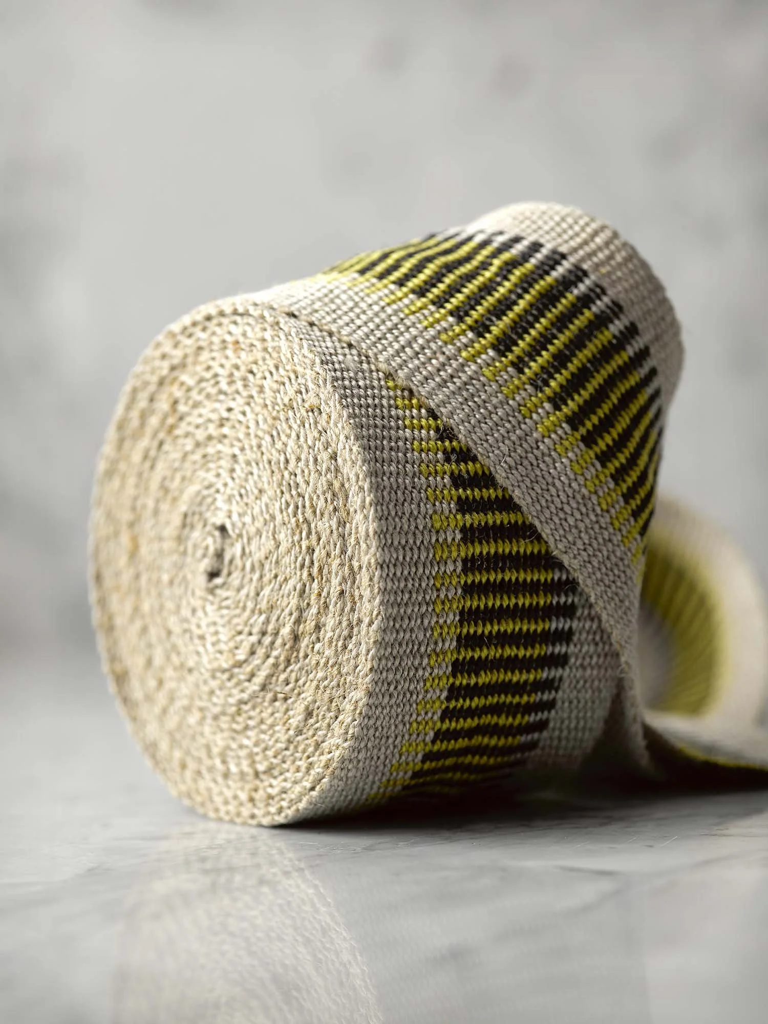 Lovegrass handwoven linen tape trim with black and citron stacked stripes in medium width.