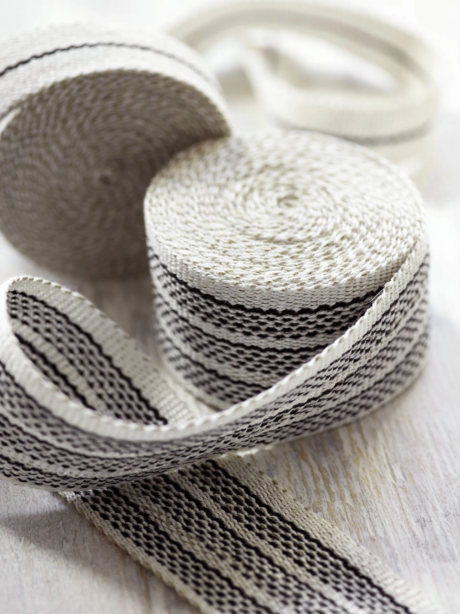 Agnes handwoven linen tape trim in crisp black and white in narrow and medium widths.