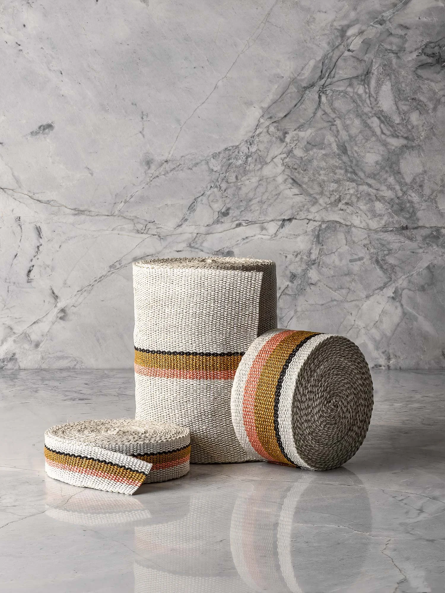 Anni handwoven linen tape trim in coral, bronze, black and white in narrow, medium and wide widths.
