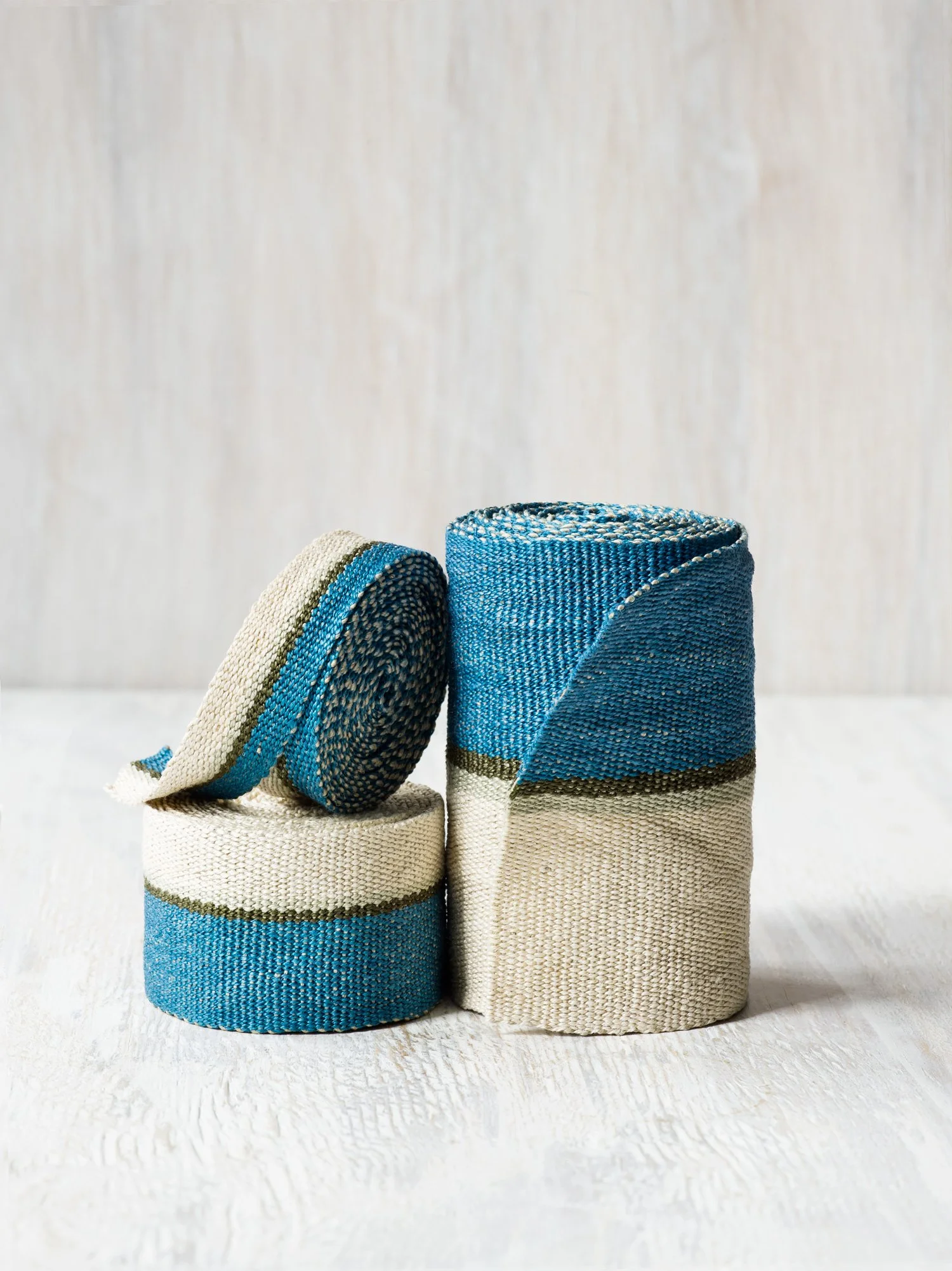 Silver Blue handwoven linen tape trim in dark cerulean blue, dark olive, sage and ivory in narrow, medium, and wide widths.