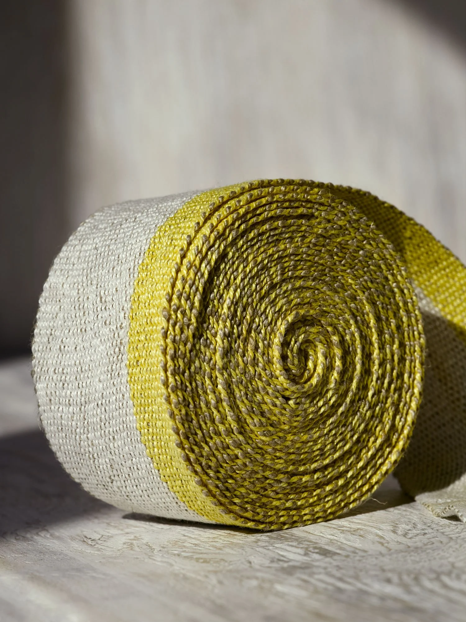 Fresh Yellow handwoven linen tape trim in a soft, bright yellow and white in medium width.