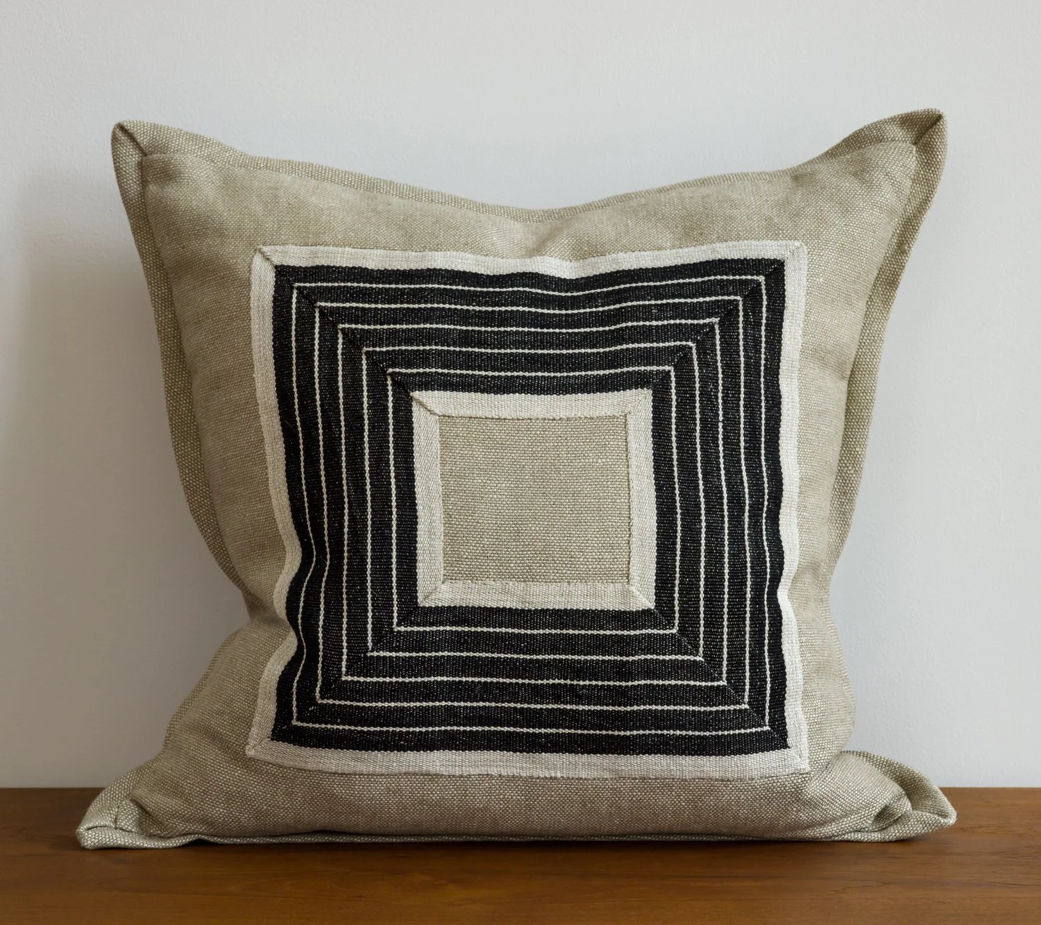 20x20" flax pillow with frame detail of Old Tuxedo wide handwoven linen tape trim