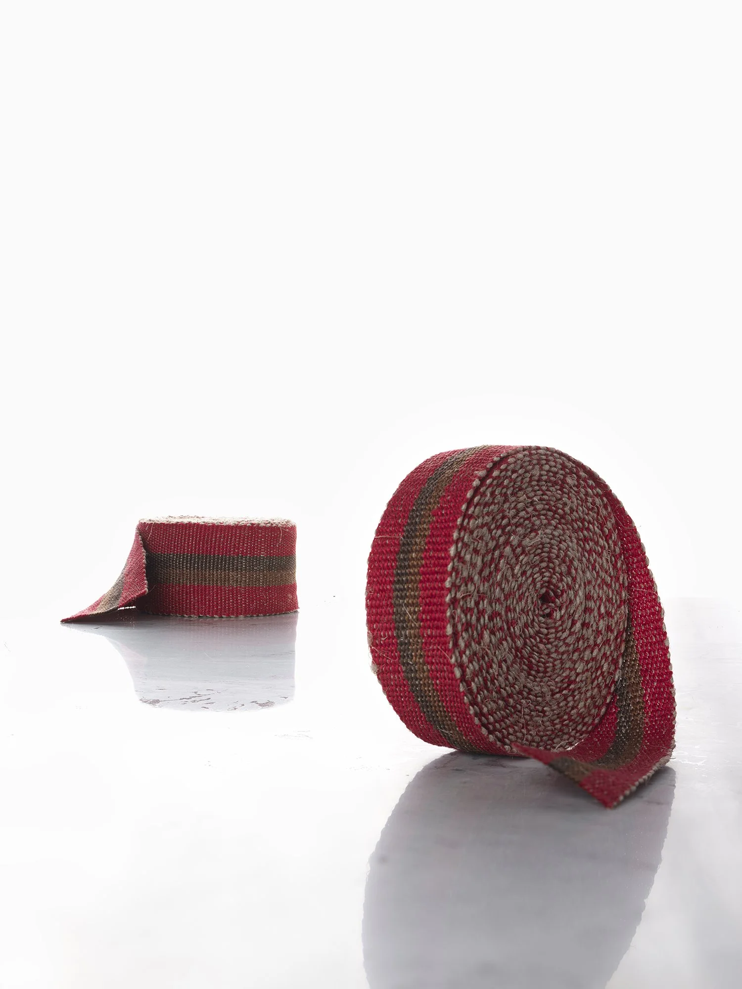 Red and Cocoa handwoven linen tape trim in deep, rich red and browns in narrow and medium widths.